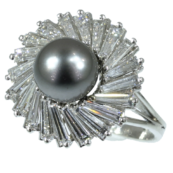 Exceptional platinum estate ring with tapered baguette diamonds and black pearl